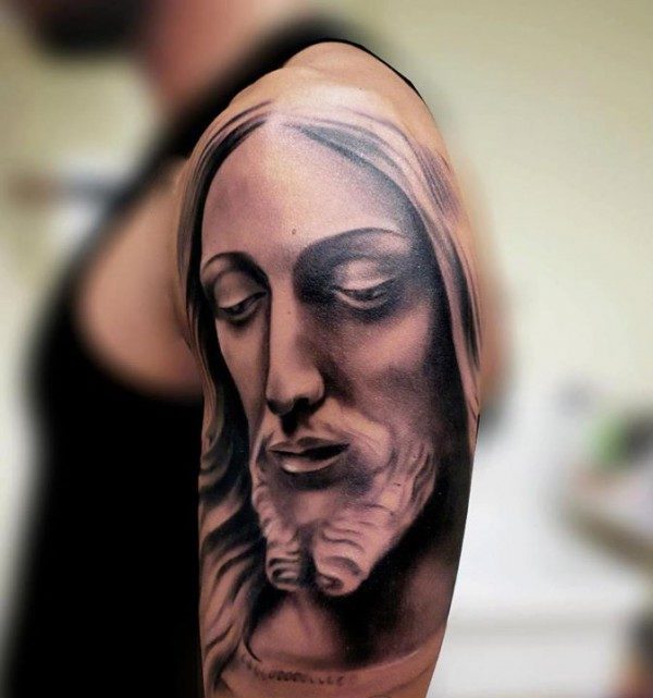 Sad Face Of Jesus Tattoo