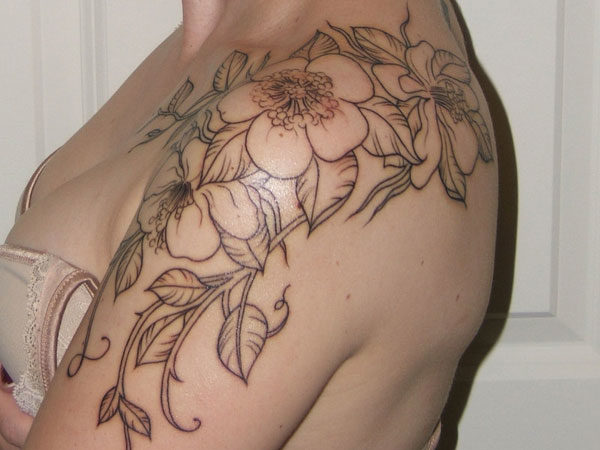 Simple Designer Tattoo On Left Shoulder
