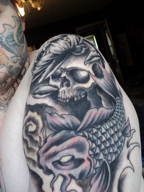 Skull And Fish Tattoo