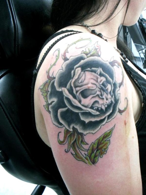 Skull In Flower Tattoo Design