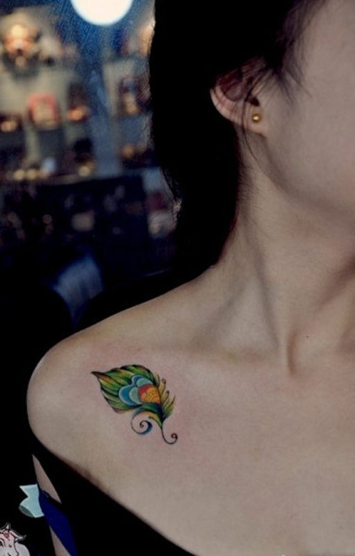 Small Colorful Peacock Wing Tattoo