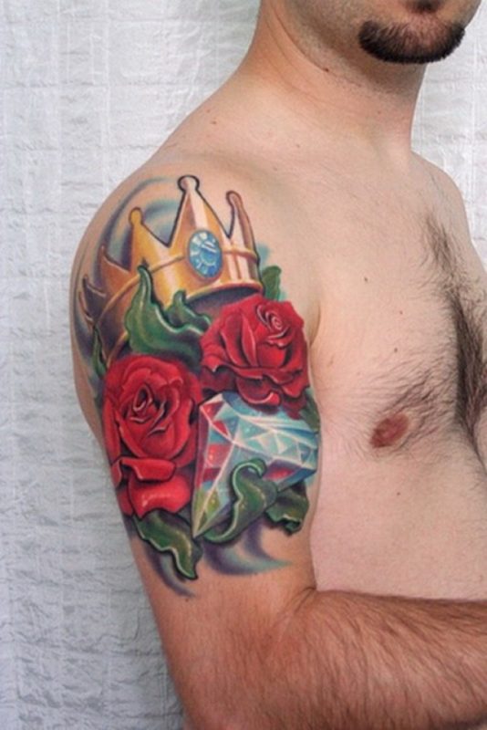 Small Flower Tattoo On Men Shoulder