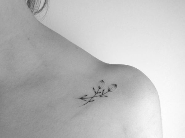 Small Black And White Shoulder Tattoo