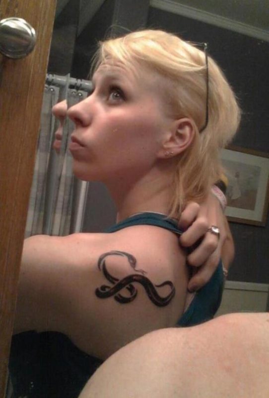 Snake Tattoo On Left Shoulder