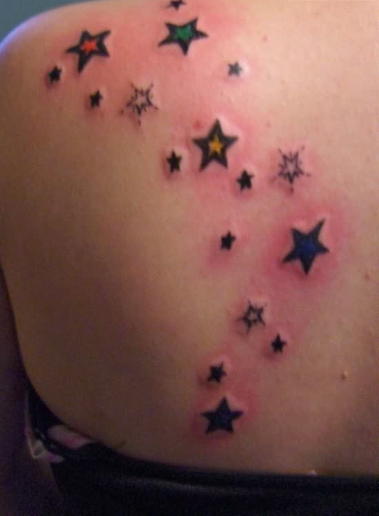 Star Tattoo On Shoulder Back