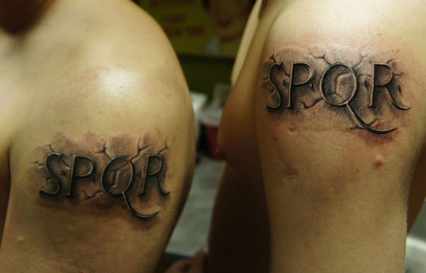 Stone Lettering Tattoo