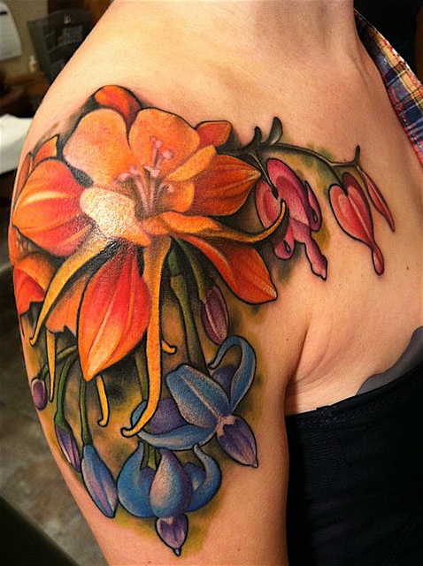 Stunning Designer Flowers Tattoo