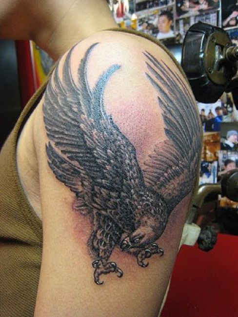 Stunning Flying Eagle Shoulder Tattoo Design