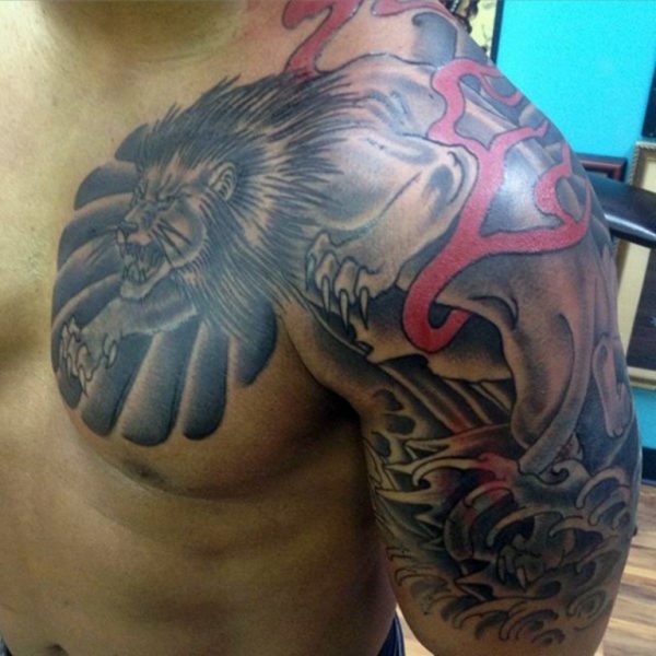 Stunning Lion Shoulder Tattoo
