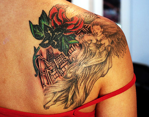 Stunning Woman Shoulder Joint Tattoo