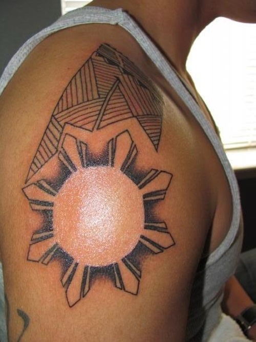 Sun Tattoo On Right Shoulder