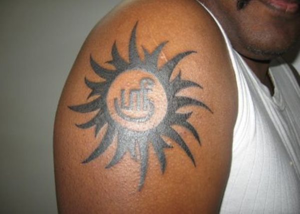 Sun Tribal Shoulder Tattoo