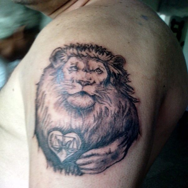 Sweet Lion Tattoo On Left Shoulder
