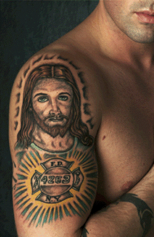 Tattoo Of Jesus On Right Shoulder