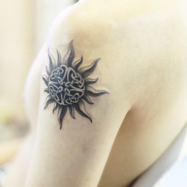 Nice Black Sun Tattoo On Shoulder