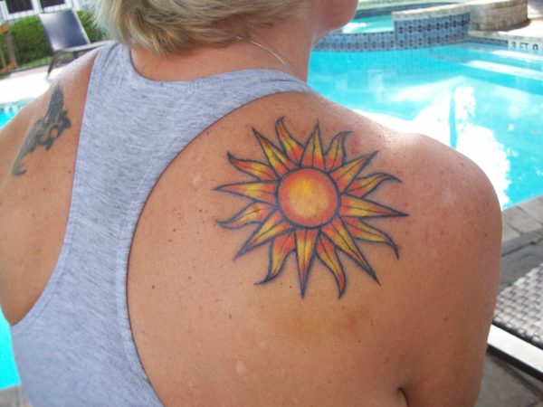 Traditional Orange Sun Tattoo