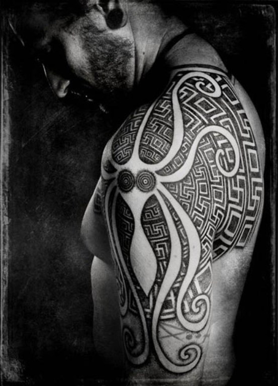 Tribal Shoulder Tattoo On Left Shoulder