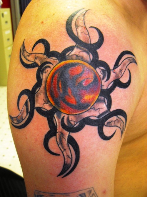 Tribal Sun Shoulder Tattoo On Right Shoulder