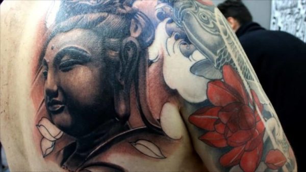 Vintage Buddhist Head Tattoo On Back Shoulder