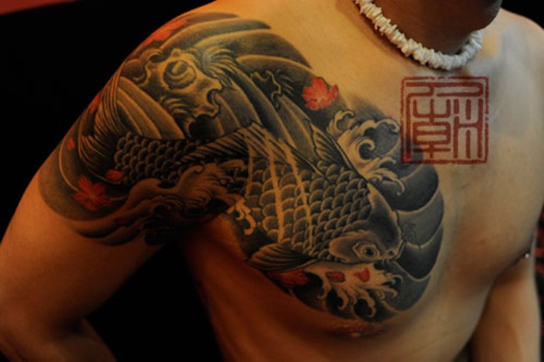 Wonderful Japanese Tattoo In Fish Pattern.
