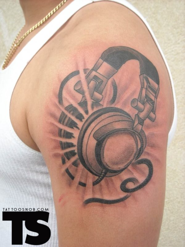 Wonderful Music Tattoo On Left Shoulder