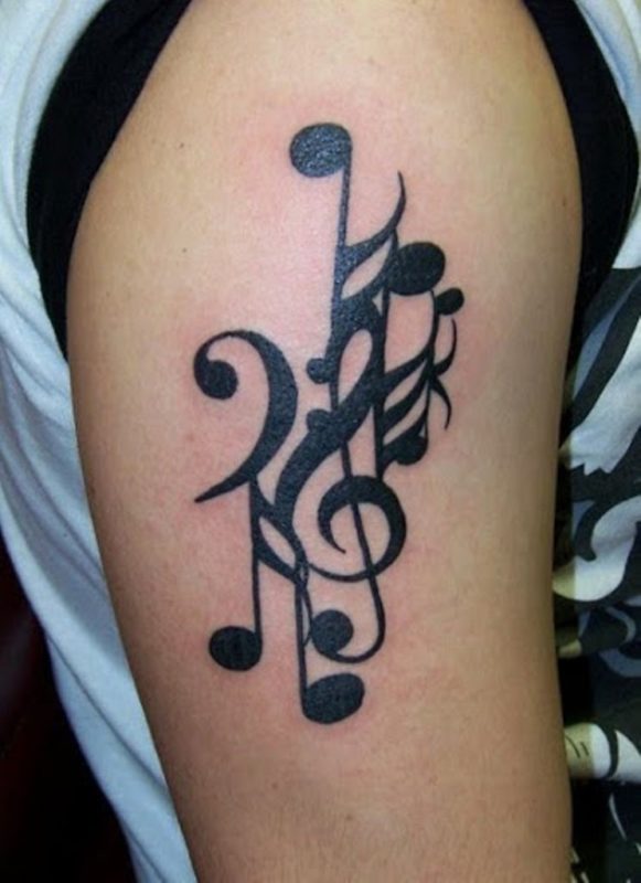 Wonderful Music Tattoo On Right Shoulder