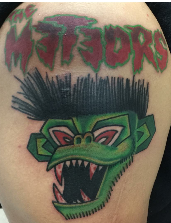 Green Face Monkey Tattoo