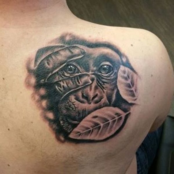 Monkey Hiding Face Shoulder Tattoo