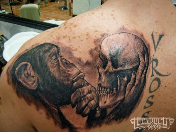 Monkey Holding Skull Shoulder Tattoo