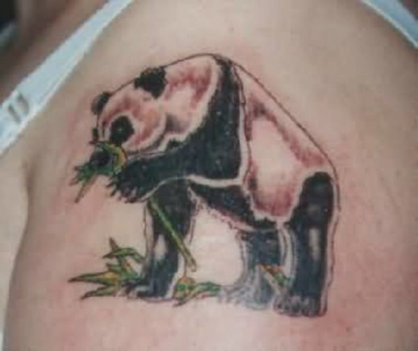 Panda Eating Grass Shoulder Tattoo